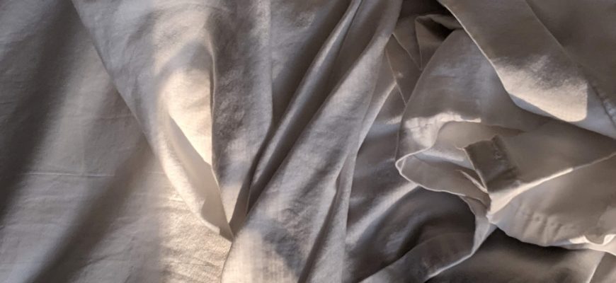 Grey sheets disheveled