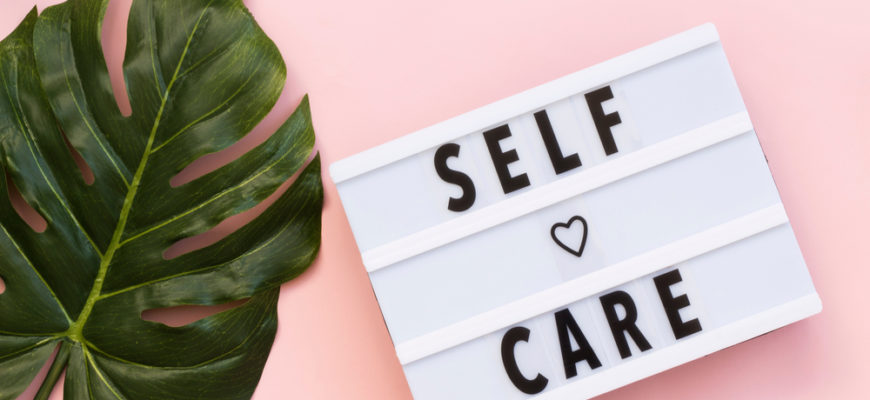Self-care,Word,On,Lightbox,On,Pink,Background,Flat,Lay.,Take